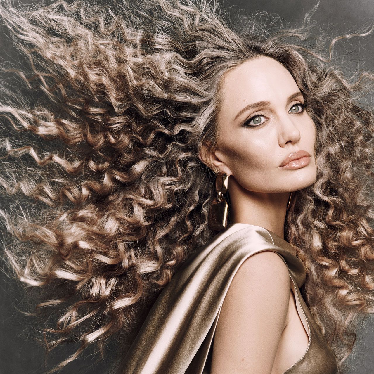 Angelina Jolie CR Fashion Book curly hair