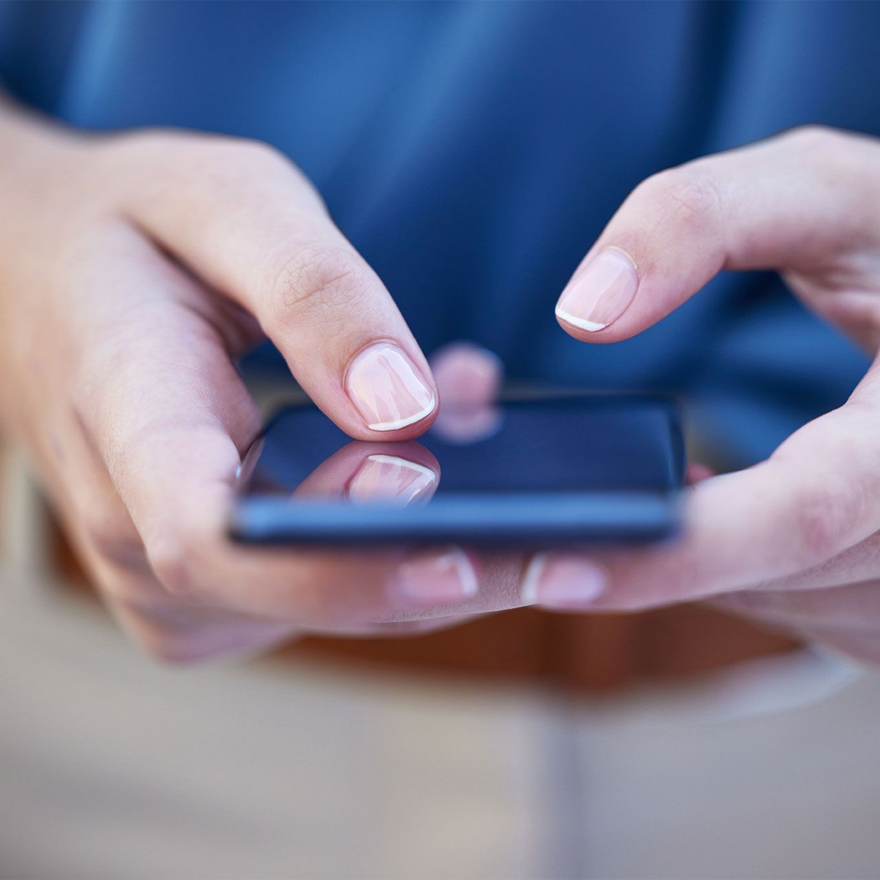 woman-texting-on-phone