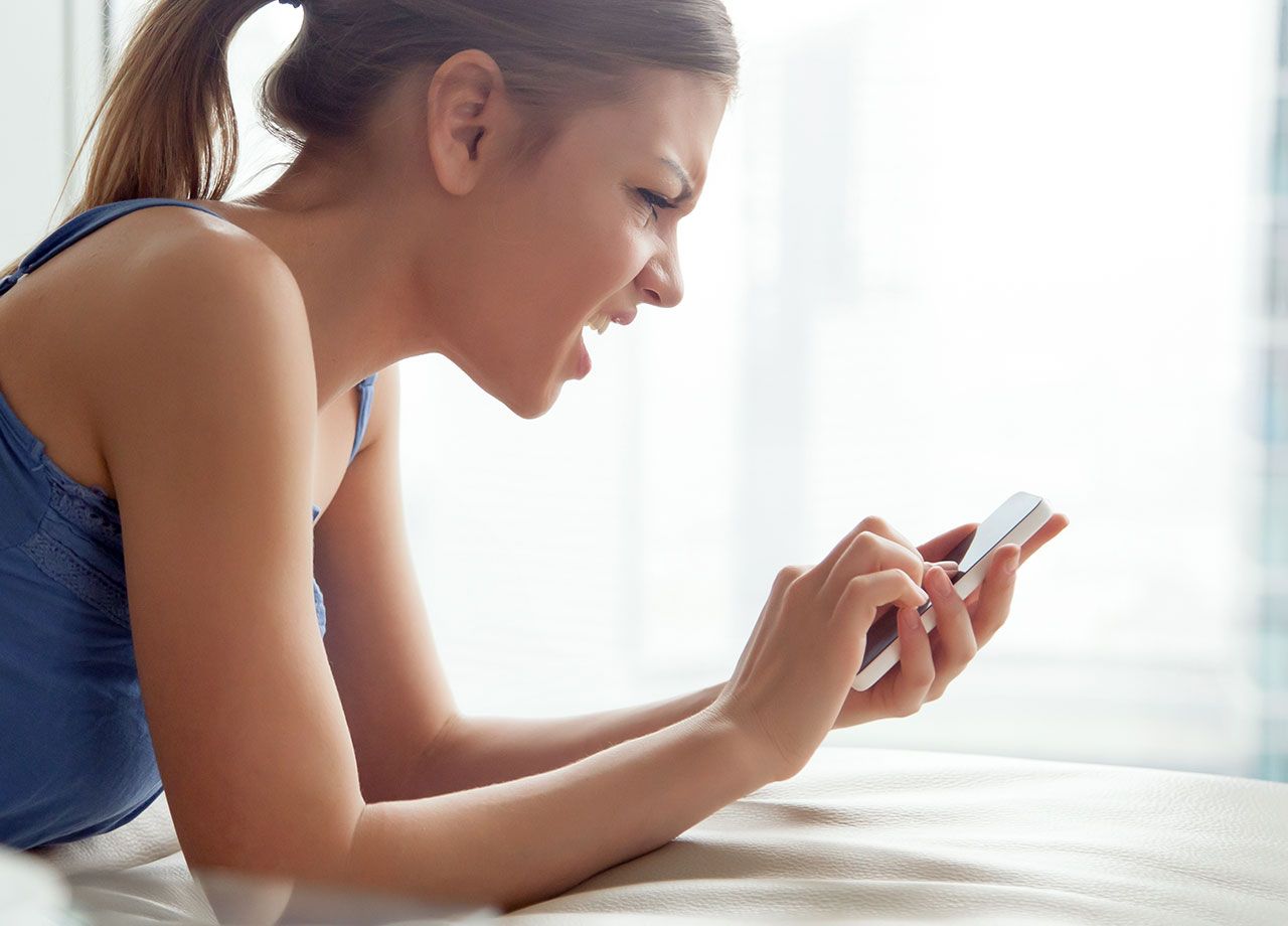 young-woman-upset-phone-scam