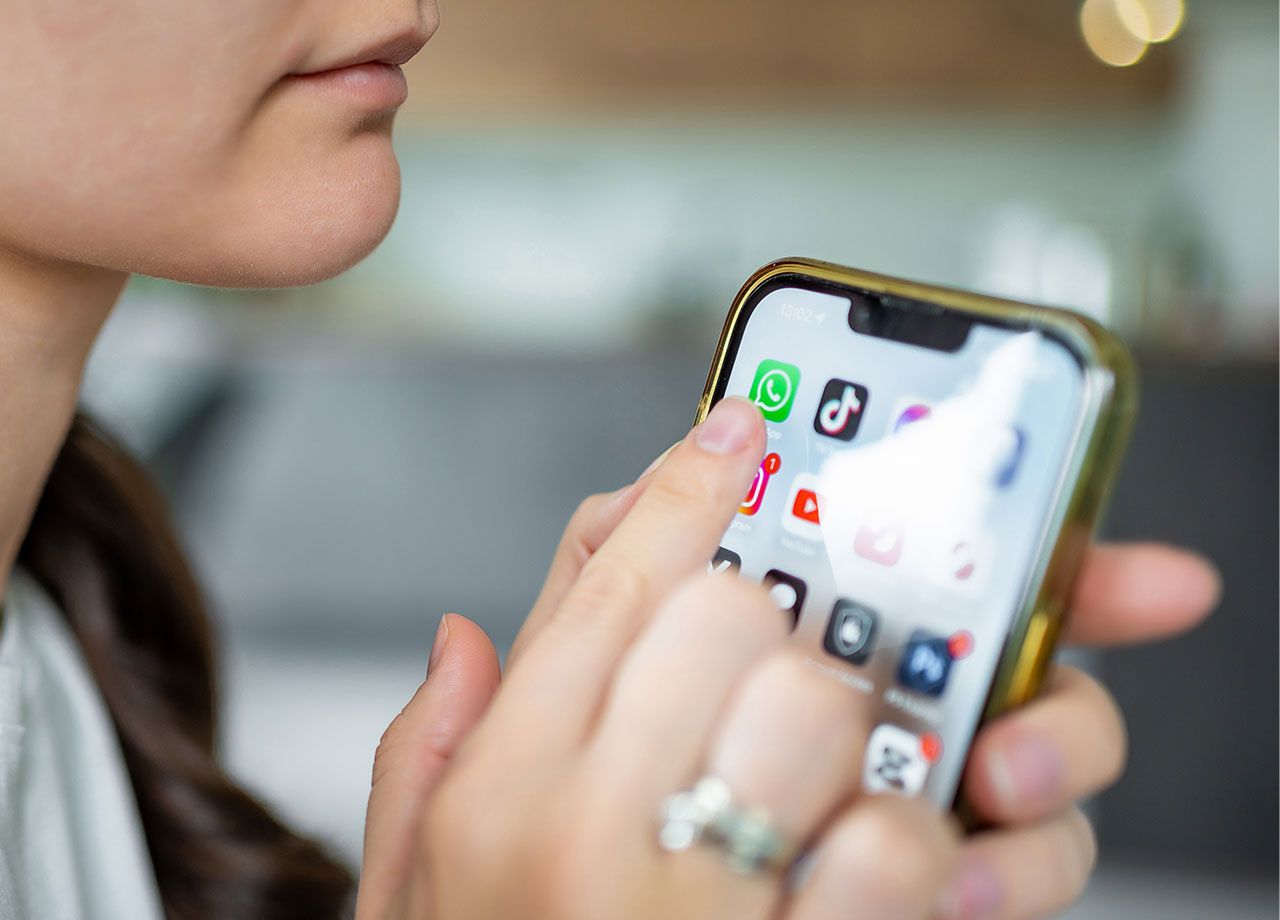 woman-using-phone-while-charging