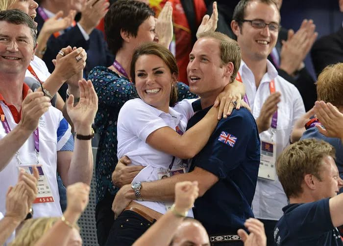 Kate Middleton and Prince William hugging at the Olympics in 2012