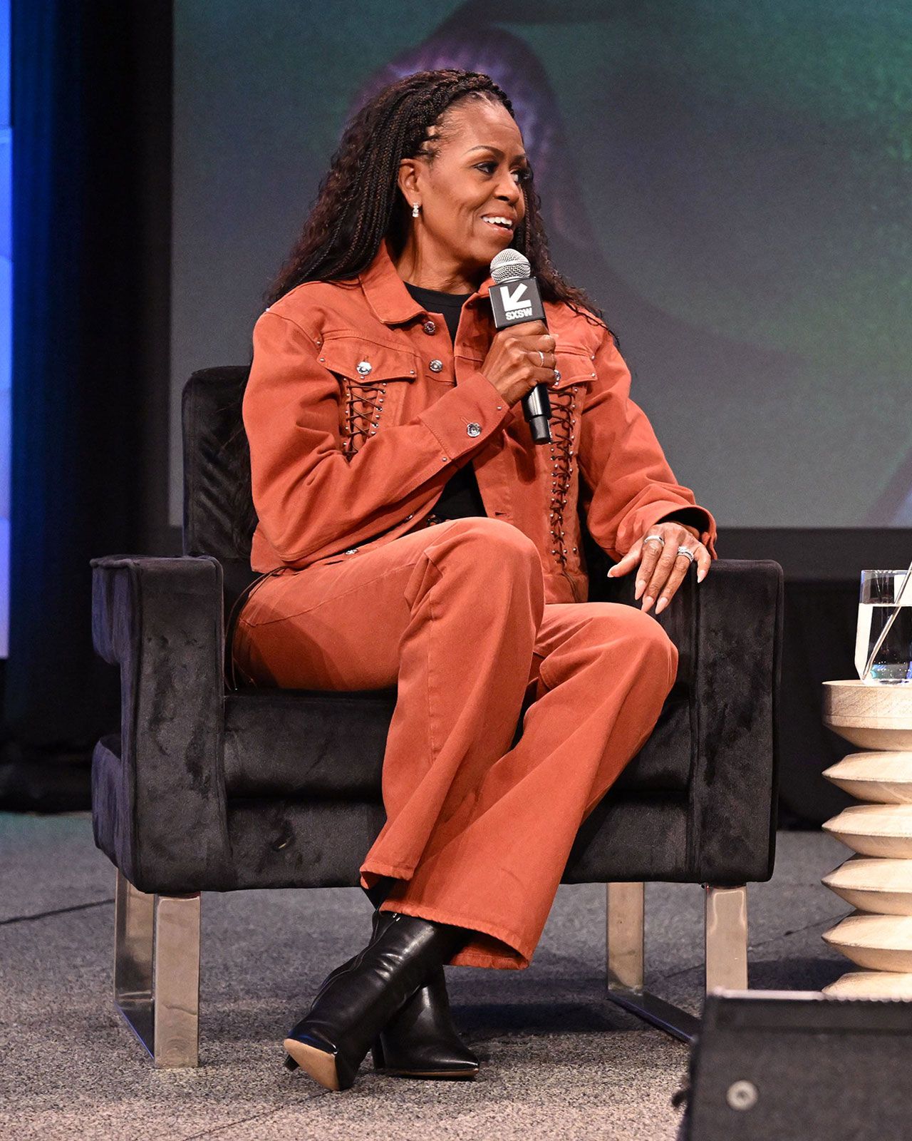 michelle obama glp-1 Michelle Obama Stuns In An Orange Western Look For Podcast Taping As Fans  Wonder About 'Ozempic'
