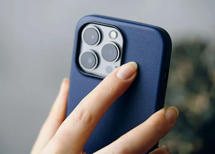 person-holding-iphone