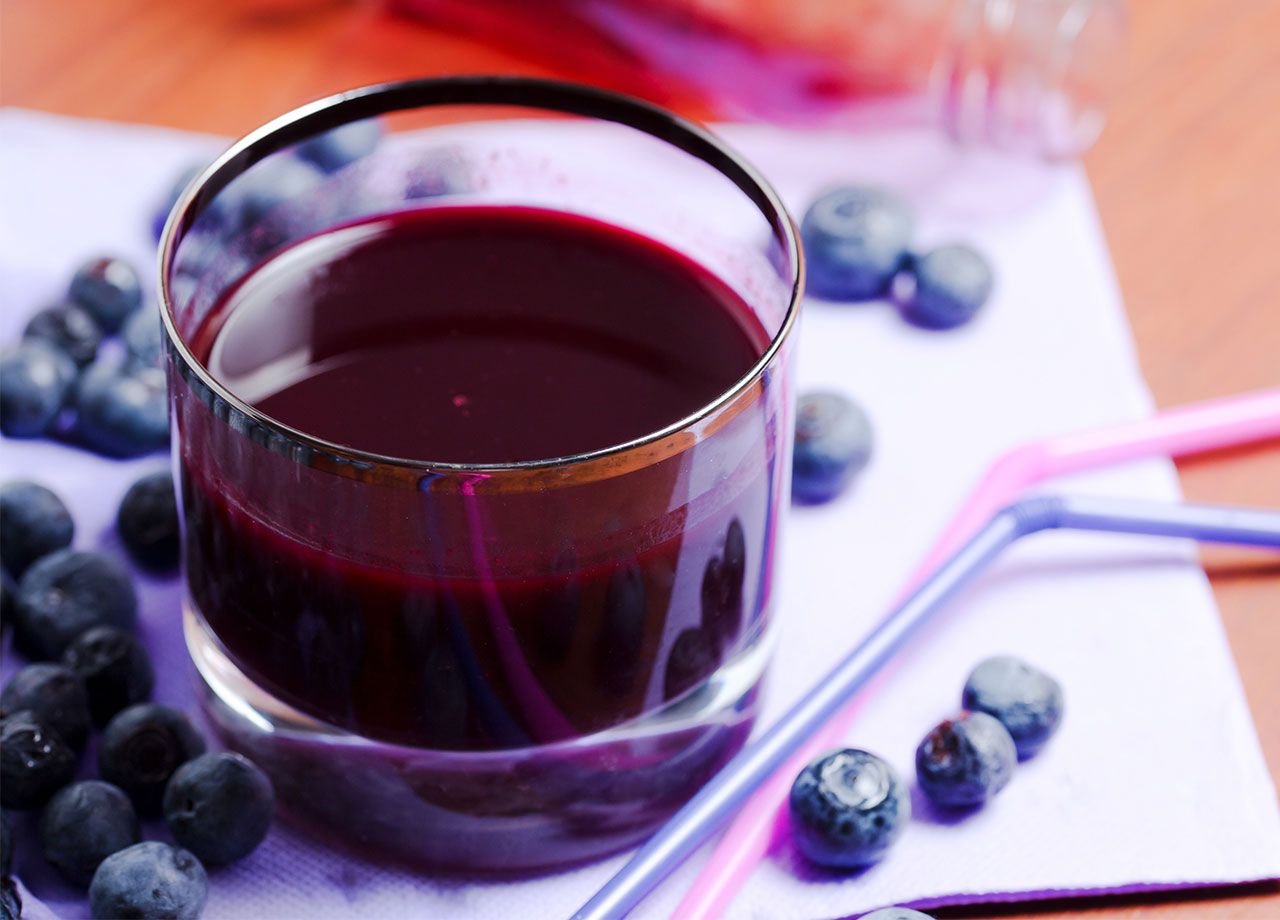 blueberry juice in a glass