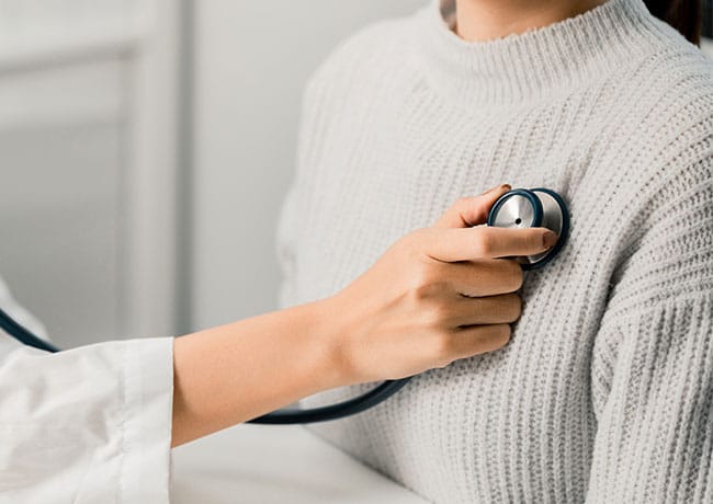 woman getting heart checked