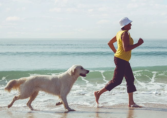 woman walking with her dog