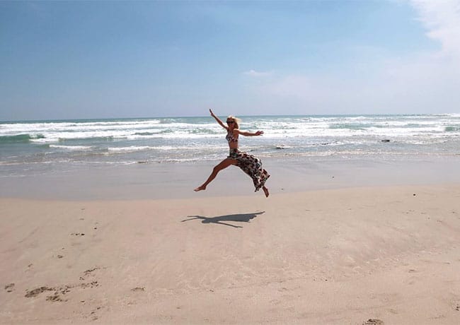 Ivanka Trump prancing on a beach