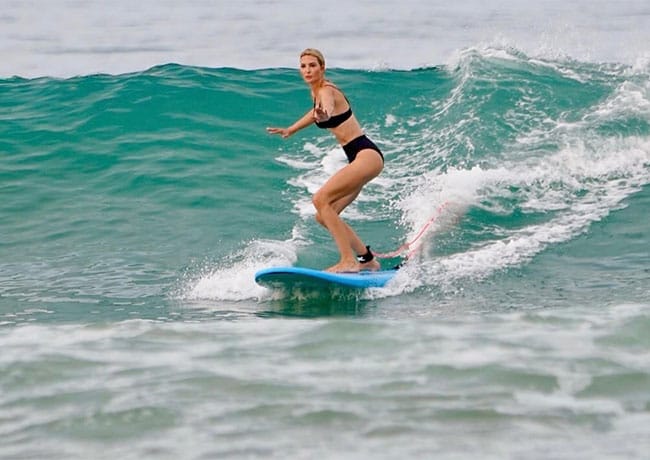 Ivanka Trump surfing in a black bikini