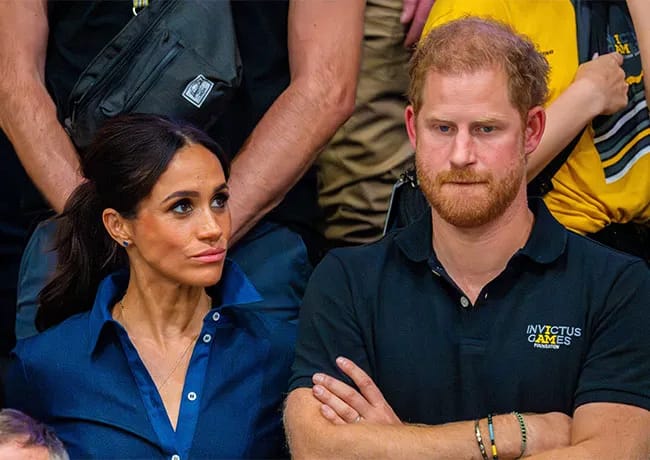 Prince Harry Meghan Markle not smiling Invictus Games