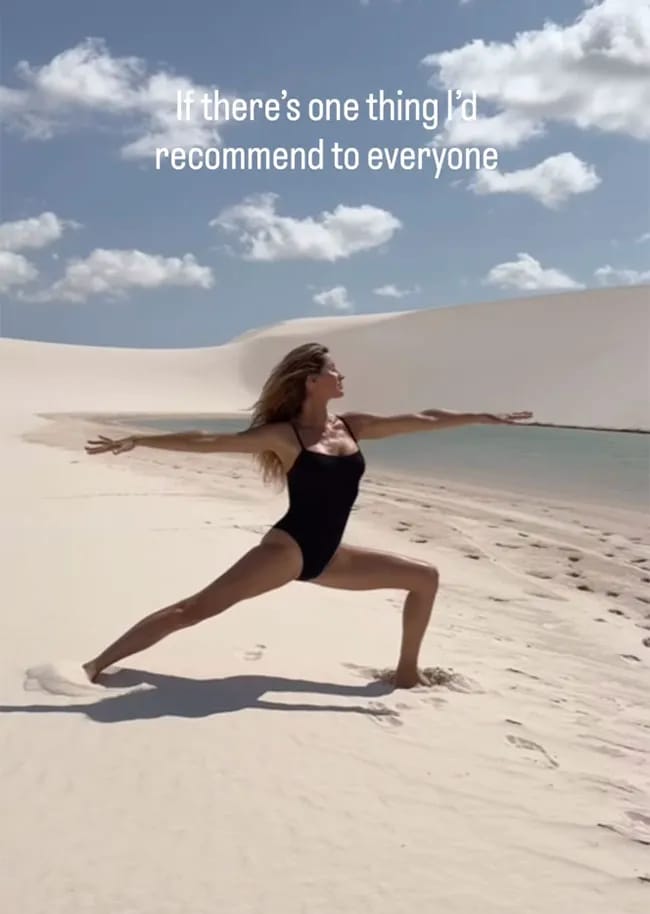 Gisele Bundchen black swimsuit beach yoga