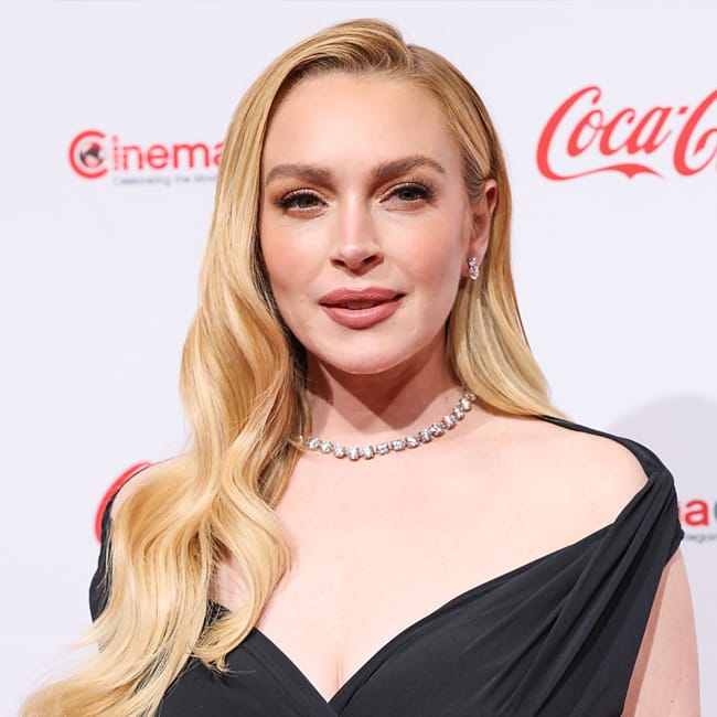 Lindsay Lohan Rocks A Mini Dress While Vaping Around Her Family As Fans  Slam Her 'Unhealthy Habit' - SHEfinds