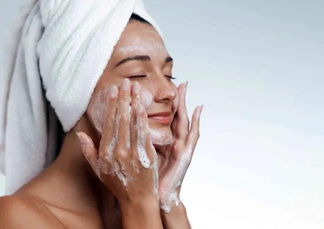 woman-washing-face