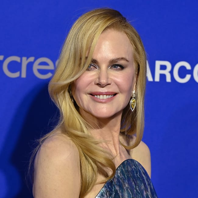 sachin and babi light blue dress Nicole Kidman Goes Backless in Balenciaga Dress at Golden Globes 2025