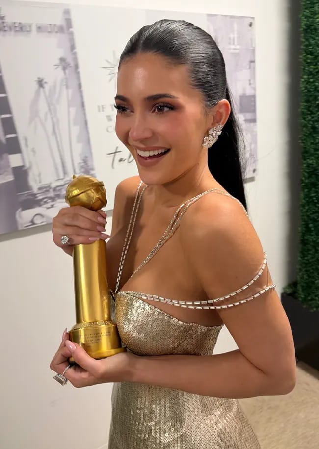 Kylie Jenner holding Timothée Chalamet's Golden Globe