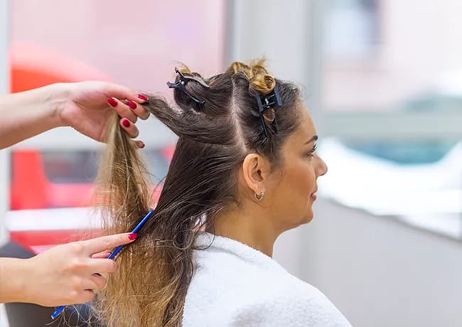 woman-sectioning-hair