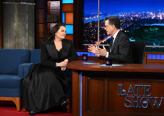 Melissa McCarthy black dress on Stephen Colbert
