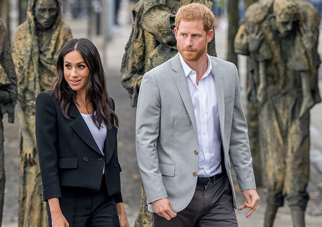 Prince Harry and Meghan Markle walking
