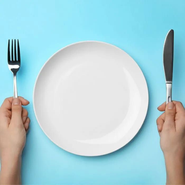 "Empty plate on a table"