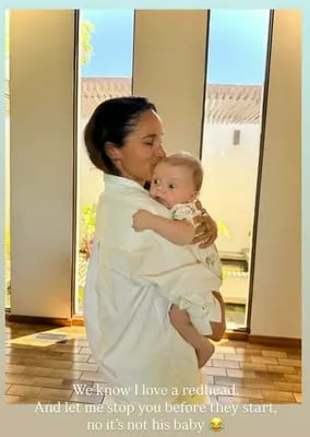 Meghan Markle with friend's baby
