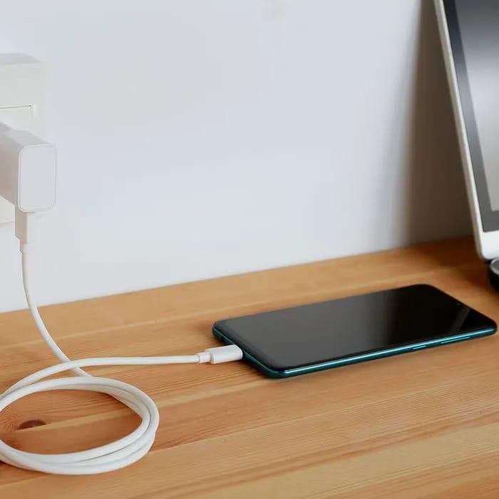 Smartphone charging with plugged-in cable