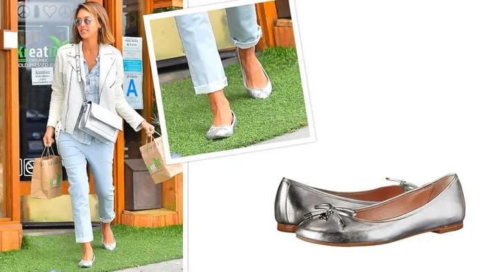 "Taylor Swift with her stylish handbag"