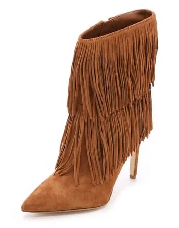 Sam Edelman Belinda Suede Fringe Booties Sam Edelman's Belinda shoes featured in an elegant setting.