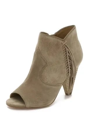 Belle by Sigerson Morrison Fume Fringe Suede Booties Sigerson Morrison's stylish shoes displayed in a chic arrangement.