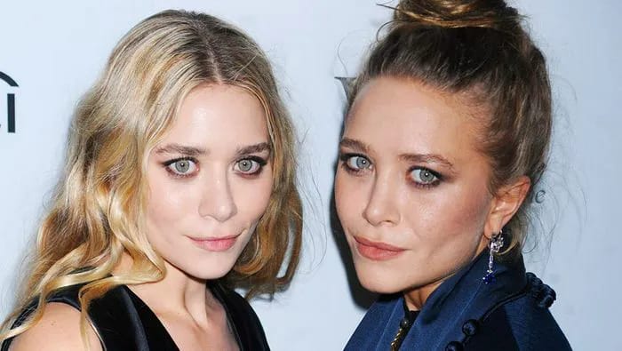 "Olsen Twins with a brush"