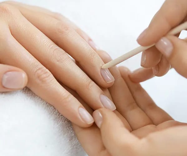 woman getting nails done