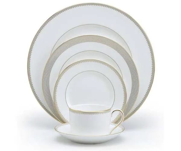white and gold matching dish set