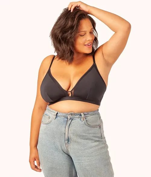 Jet black busty bralette model front view.