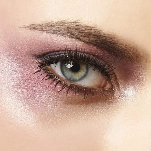 "Close-up of pink eyeshadow application"