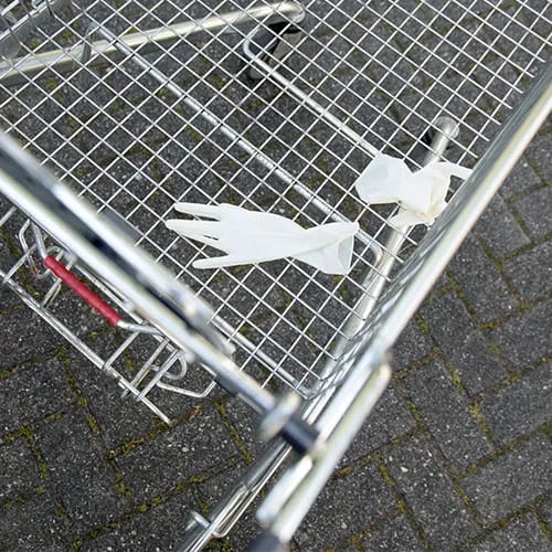 Discarded gloves in a grocery store during COVID-19