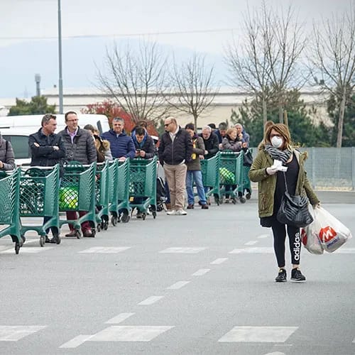 Shopper navigating grocery store during COVID-19