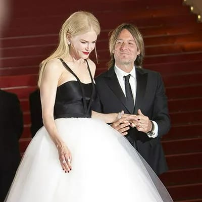Nicole Kidman and Keith Urban posing for a photo together.