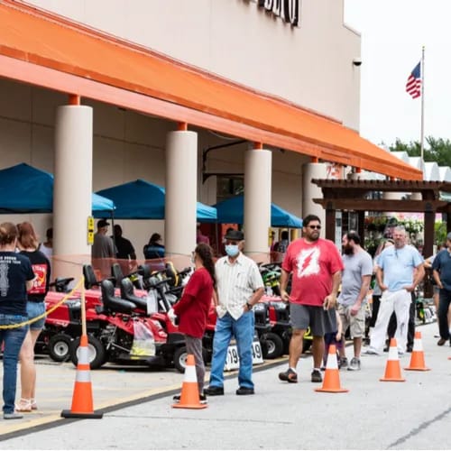 Shoppers waiting in line at a grocery store