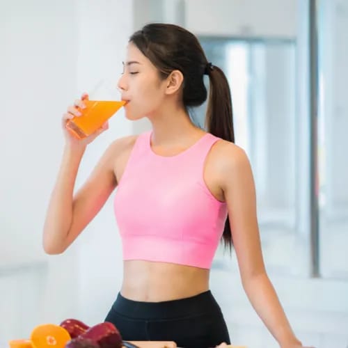 woman drinking juice