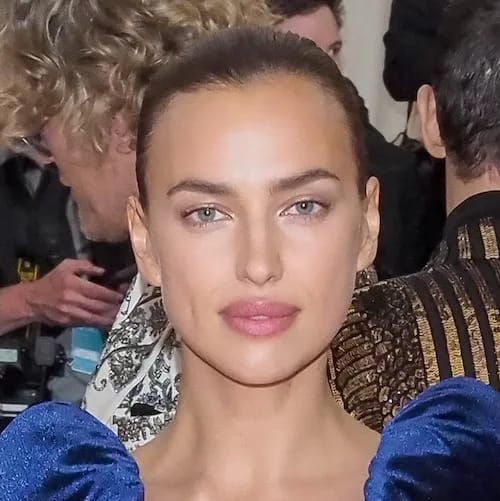 Irina Shayk poses gracefully, exemplifying beauty and elegance.