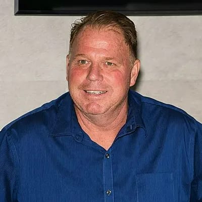 Thomas Markle Jr. posing for a photo at an event.