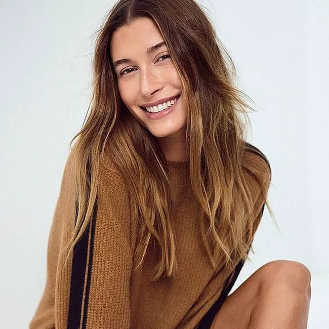 Hailey Bieber flaunts her trendy look in a casual setting.