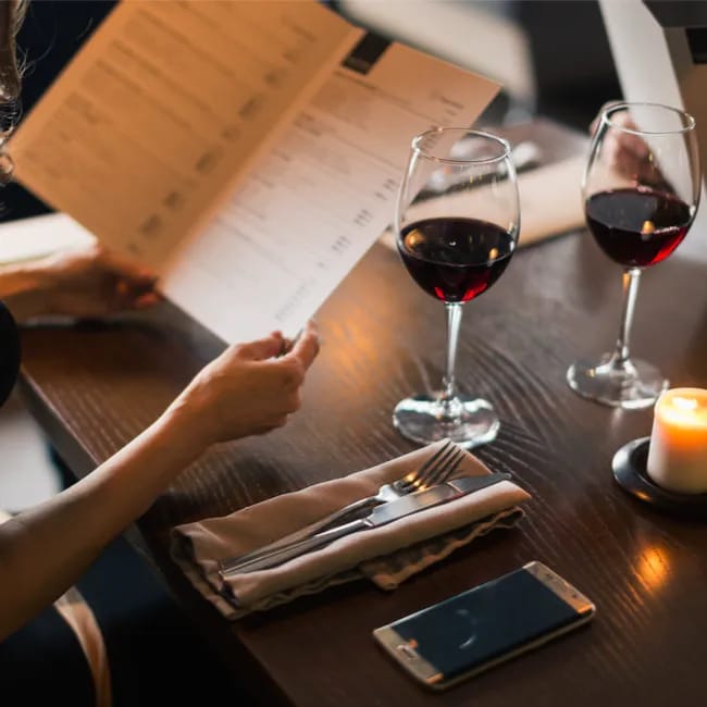 "Ordering wine at a restaurant"