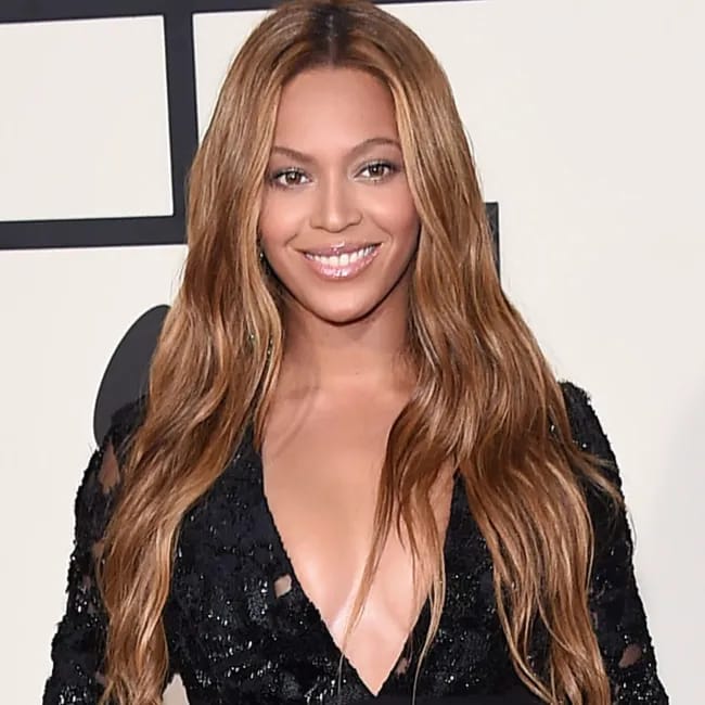 "Beyoncé in a skintight velvet mini dress"