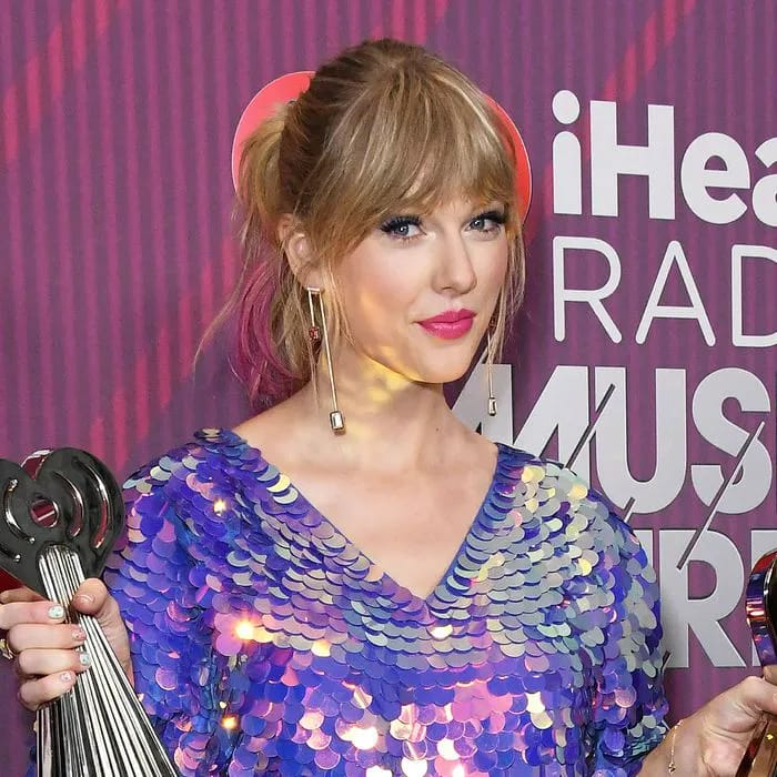 Taylor Swift in sparkling blue jumpsuit at iHeartRadio Music Awards