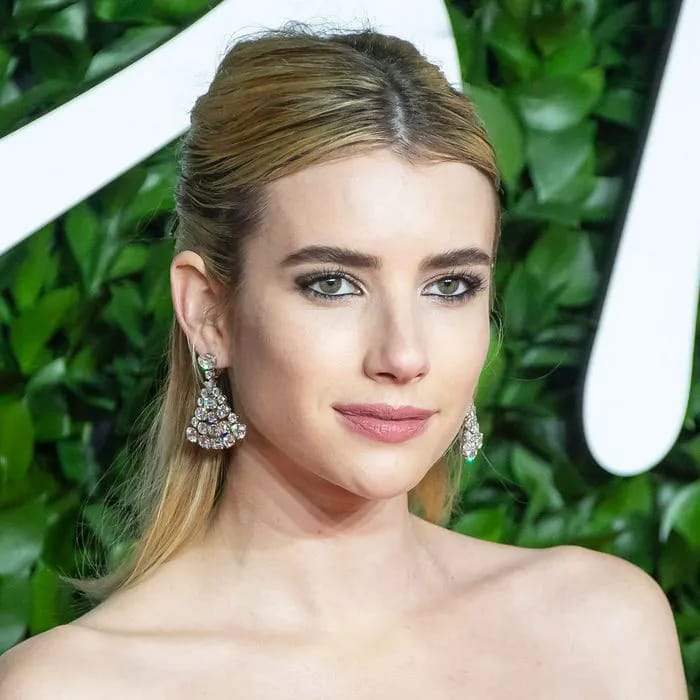 Emma Roberts posing for a portrait.