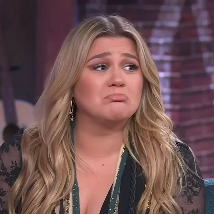 "Kelly Clarkson looking emotional on TV"