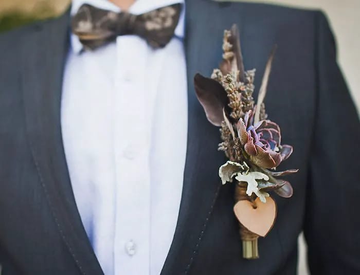 Big Boutonnieres Man wearing oversized boutonnieres