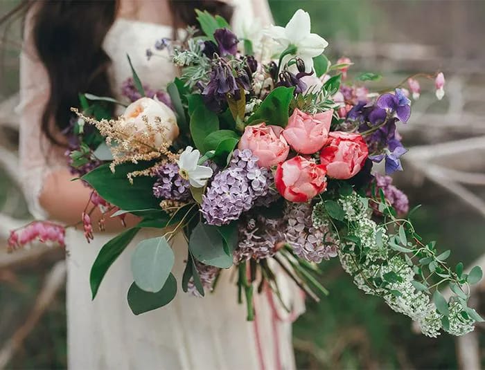 Oversized Boho Bouquets Bride holding oversized boho bouquet
