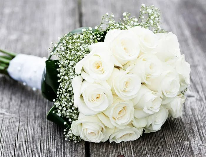 All-White Designs All-white wedding bouquet