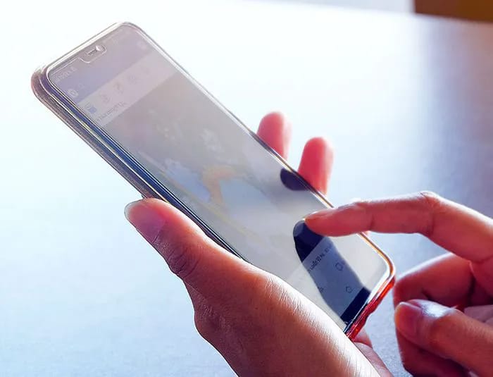 person-scrolling-iphone