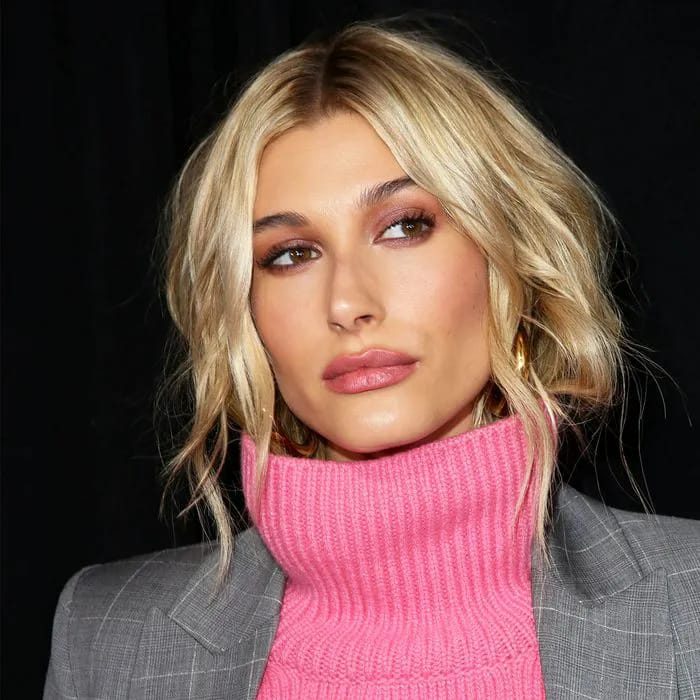 Hailey Bieber dazzles in a trendy pleated mini skirt at a date night.